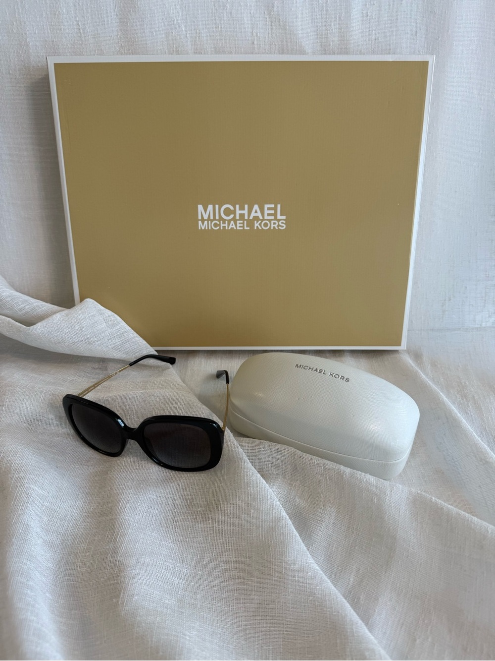Michael Kors Black Sunglasses with Gold Temples and White Case